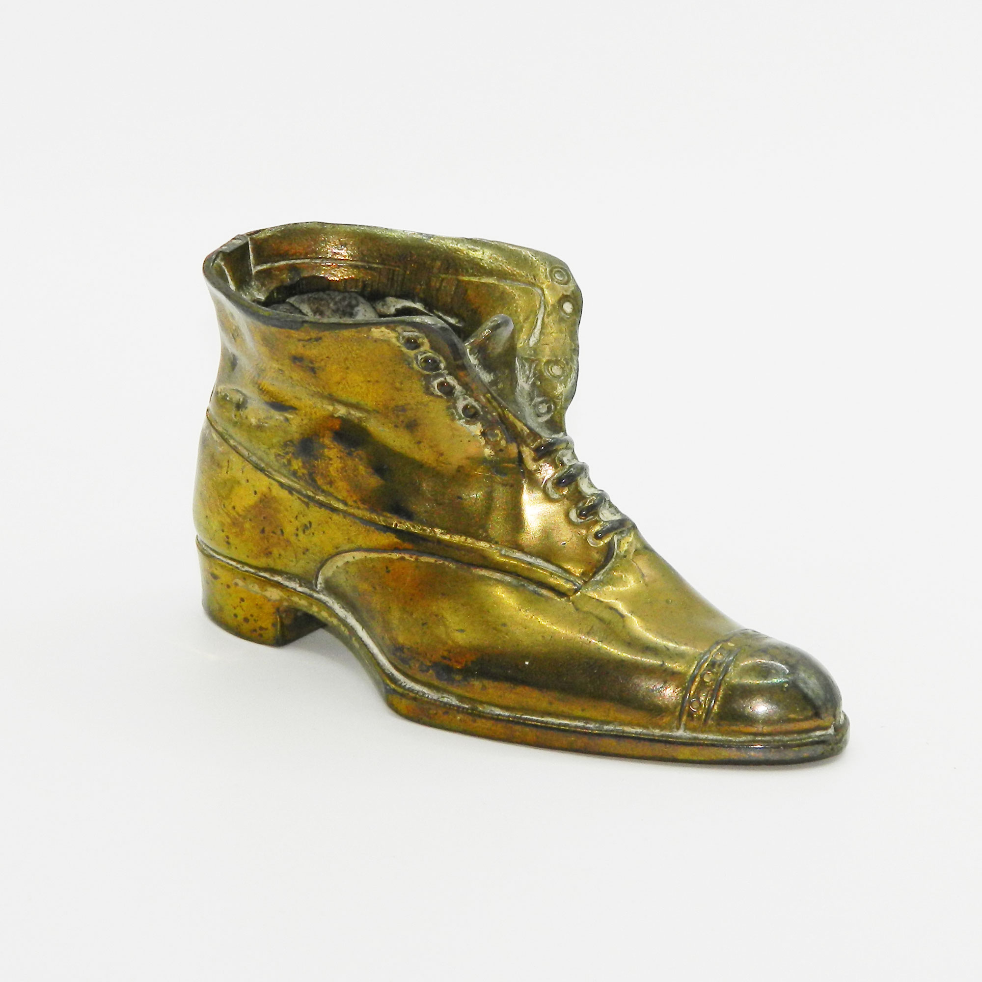 Antique metal shoe