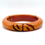 carved red orange bakelite bangle