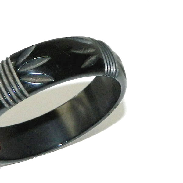 Carved black bakelite bangle