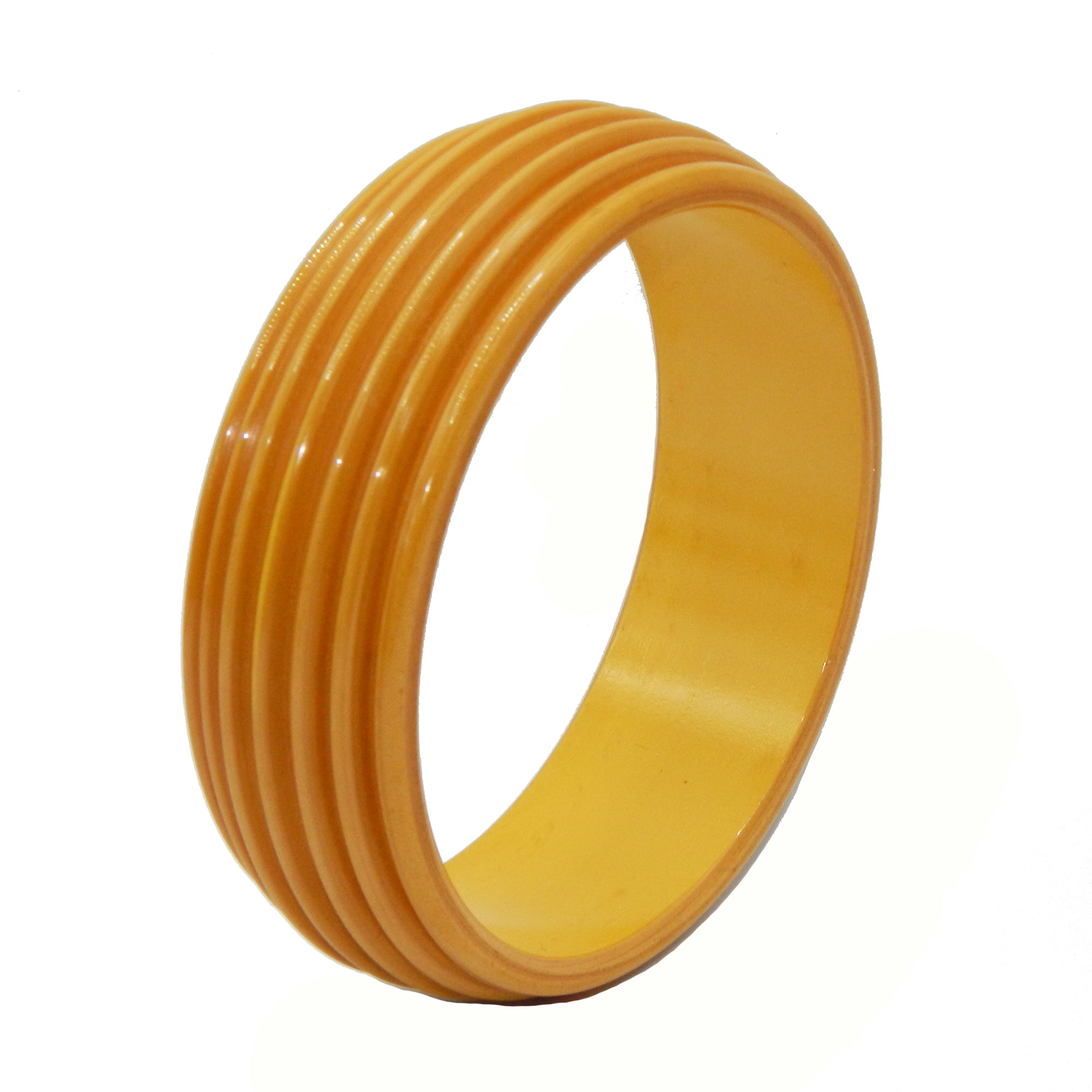 Carved yellow bakelite bangle