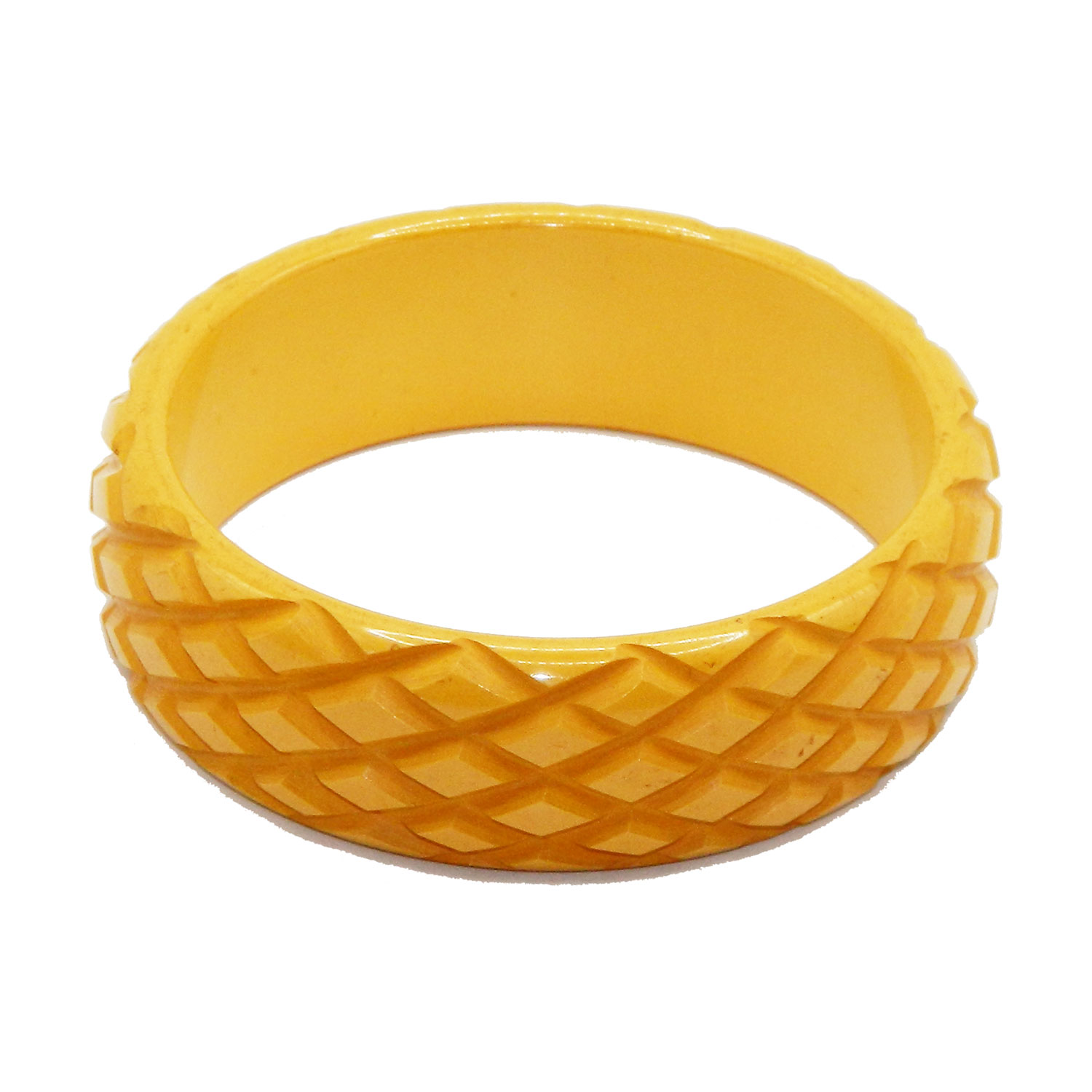 Carved yellow bakelite bangle