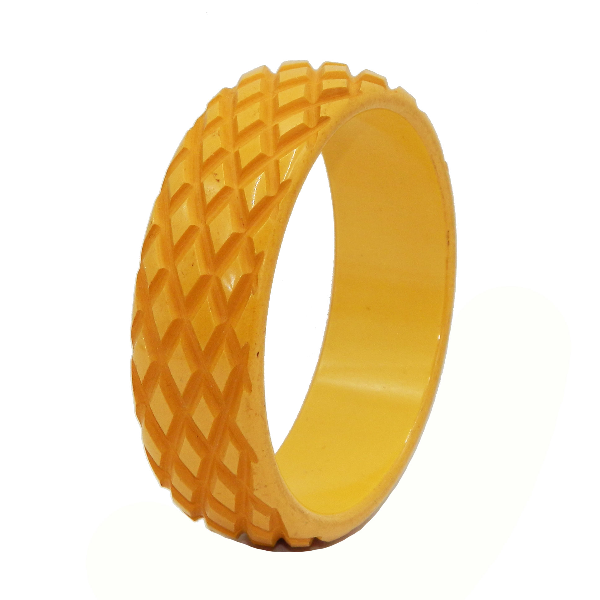 Carved yellow bakelite bangle