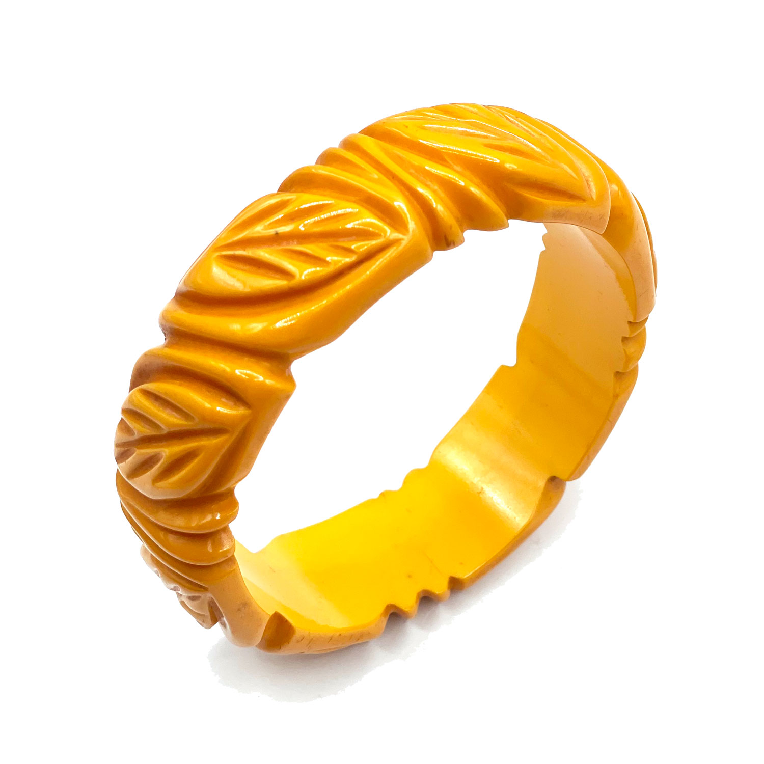 Deeply carved yellow bakelite bangle