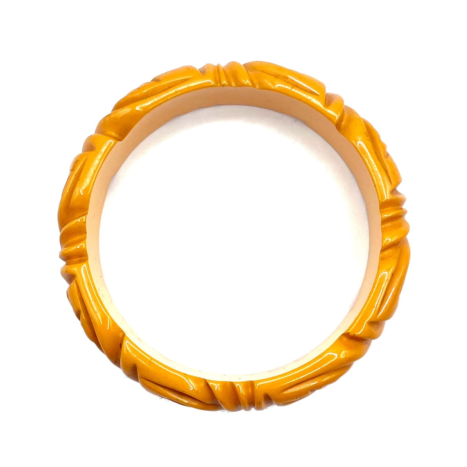 Deeply carved yellow bakelite bangle