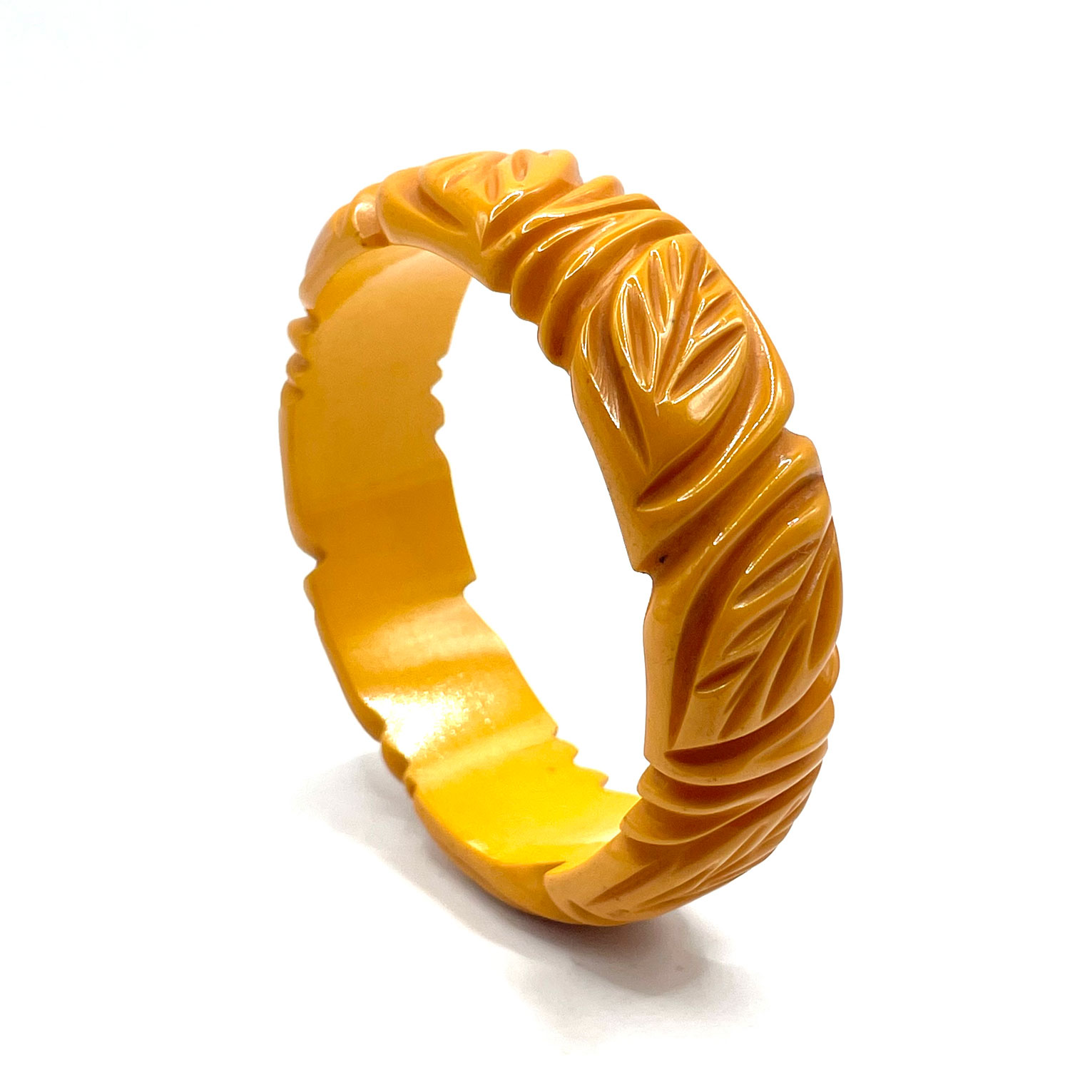 Deeply carved yellow bakelite bangle