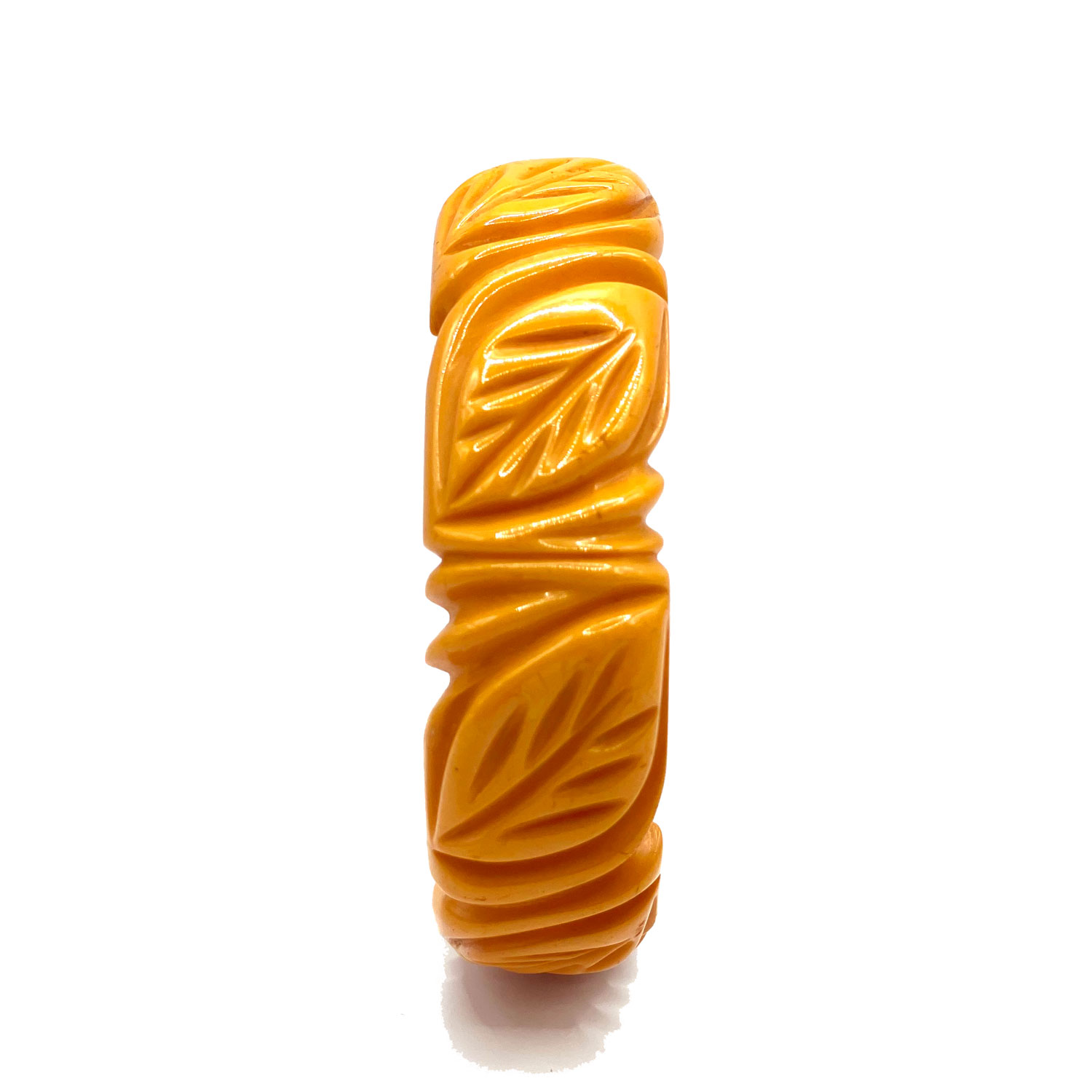 Deeply carved yellow bakelite bangle