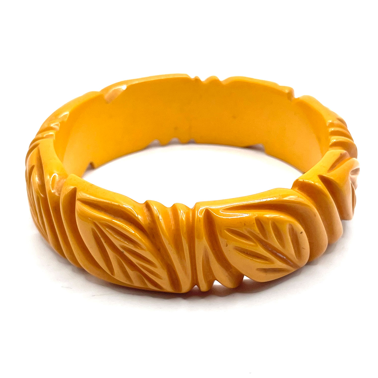 Deeply carved yellow bakelite bangle