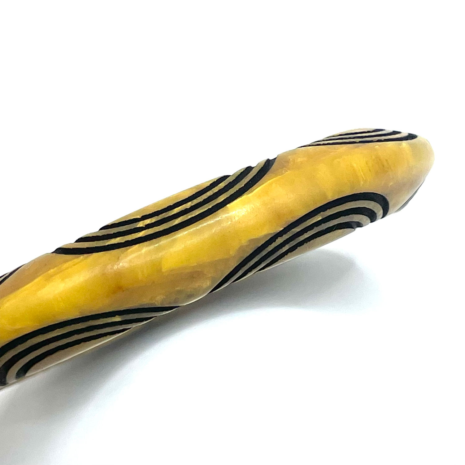 Carved overdyed bakelite bangle bracelet