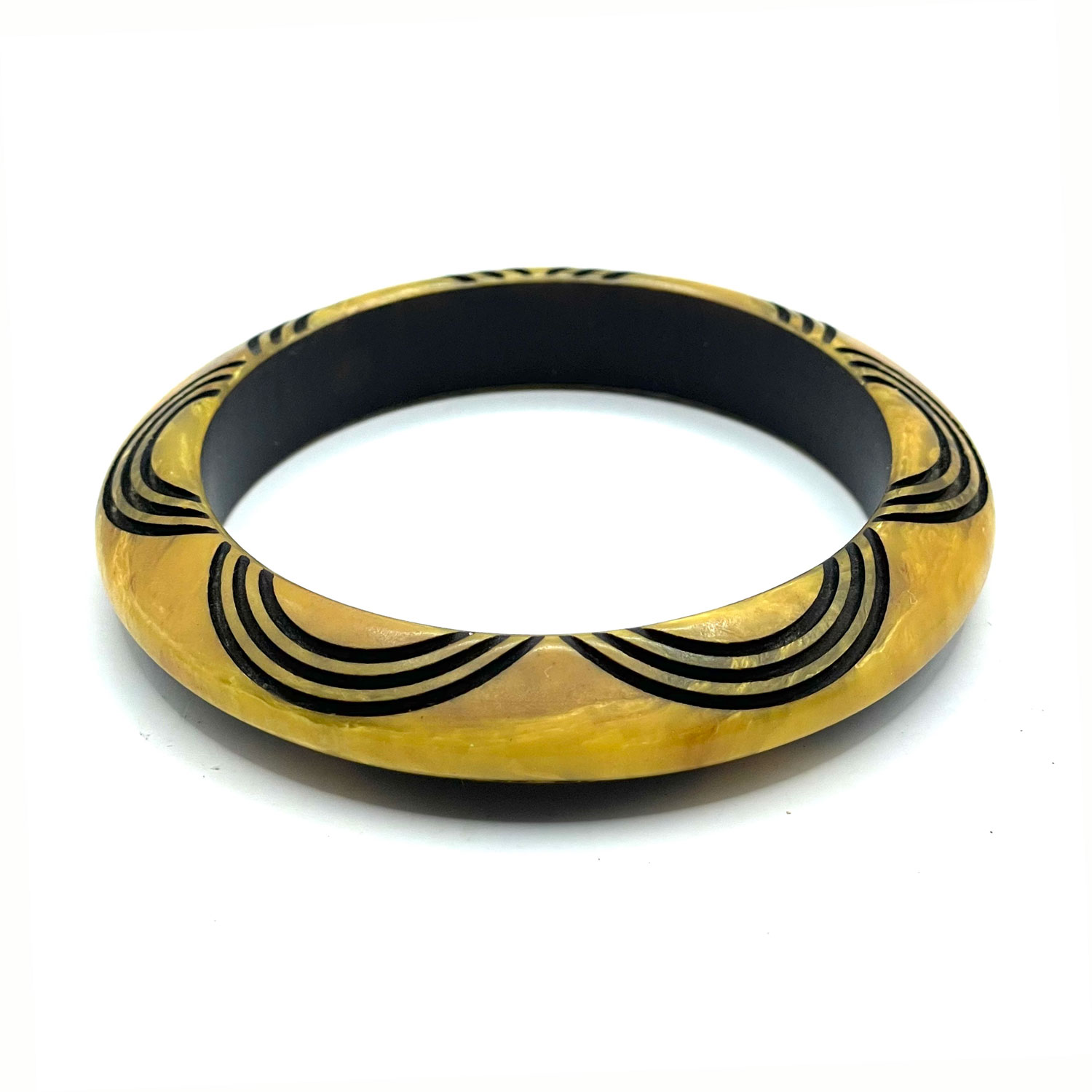 Carved overdyed bakelite bangle bracelet