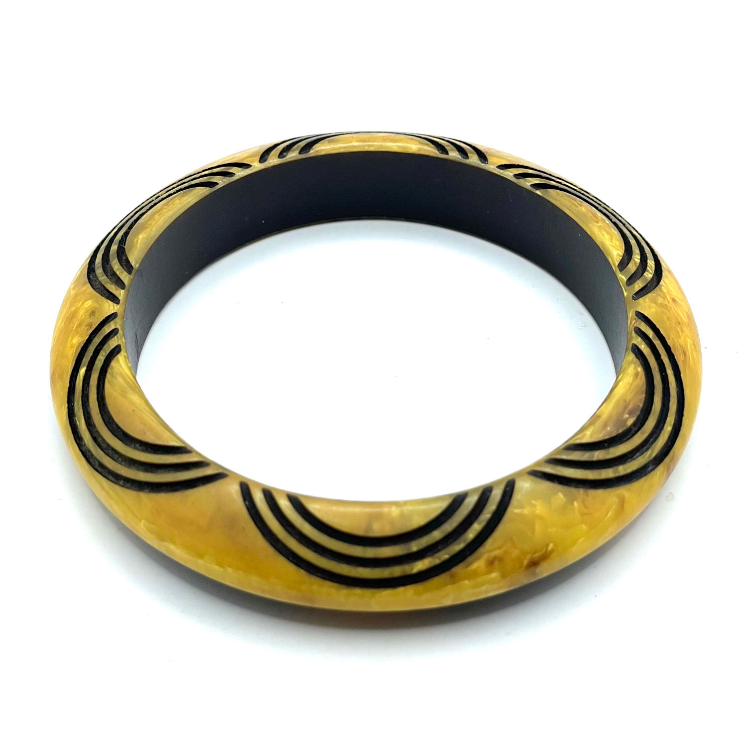 Carved overdyed bakelite bangle bracelet