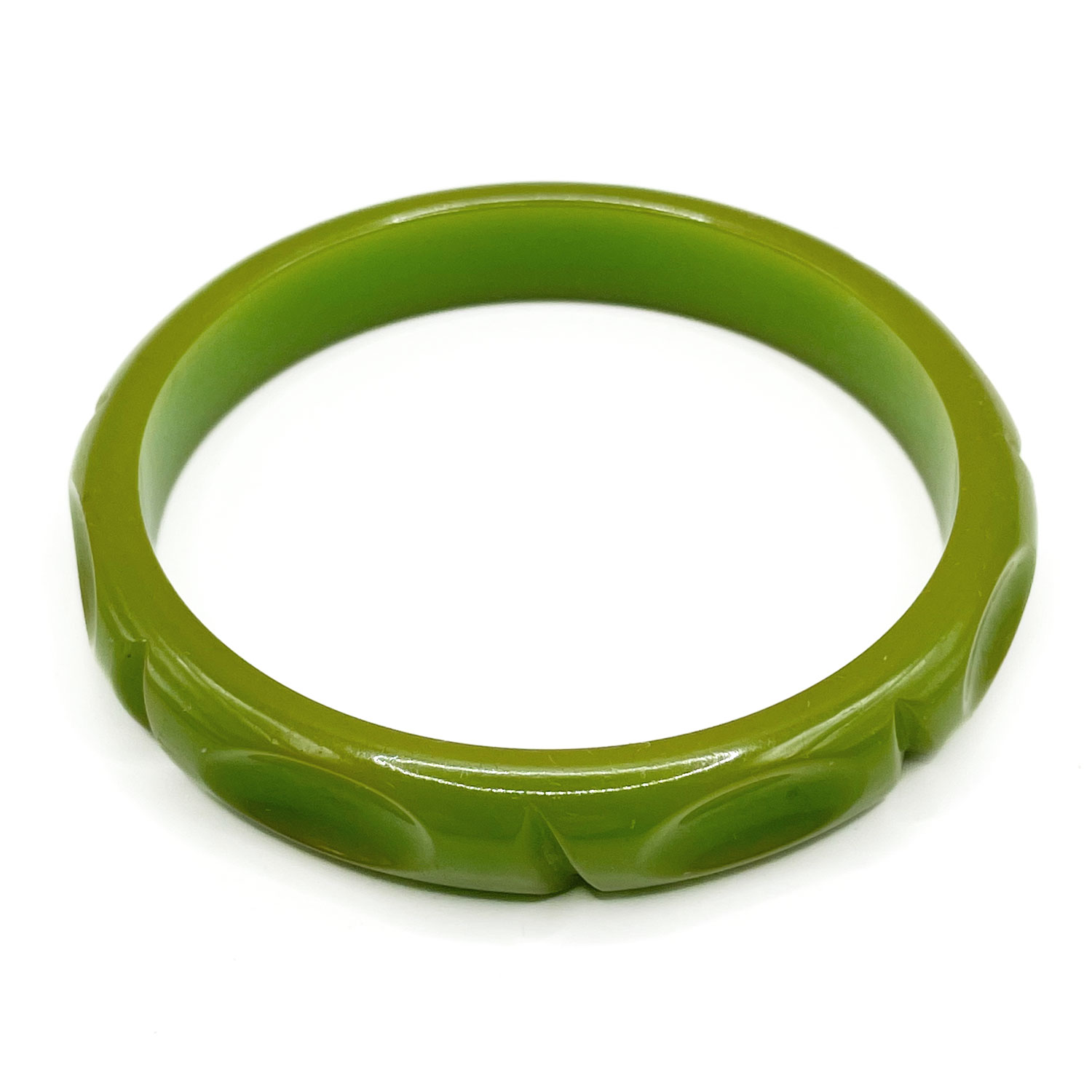 Carved green bakelite bangle