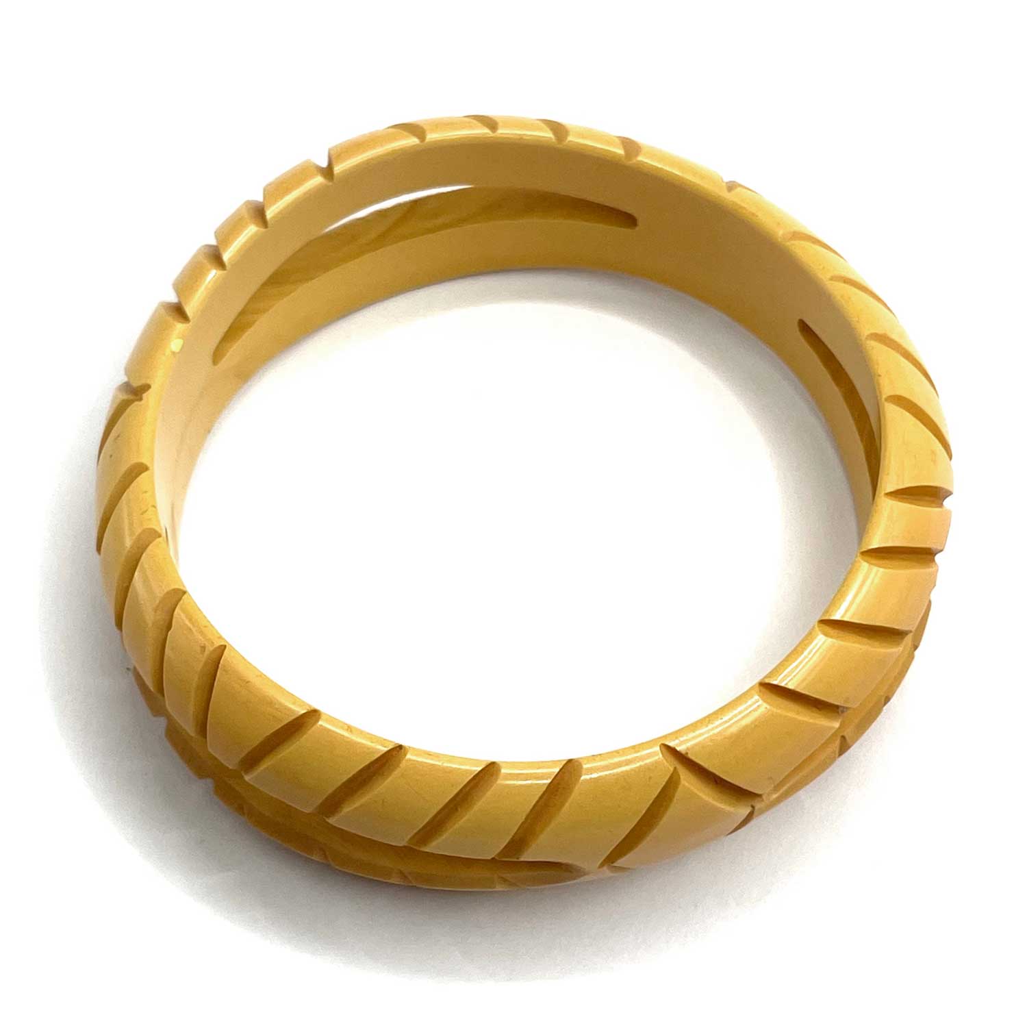 Carved pierced bakelite bangle