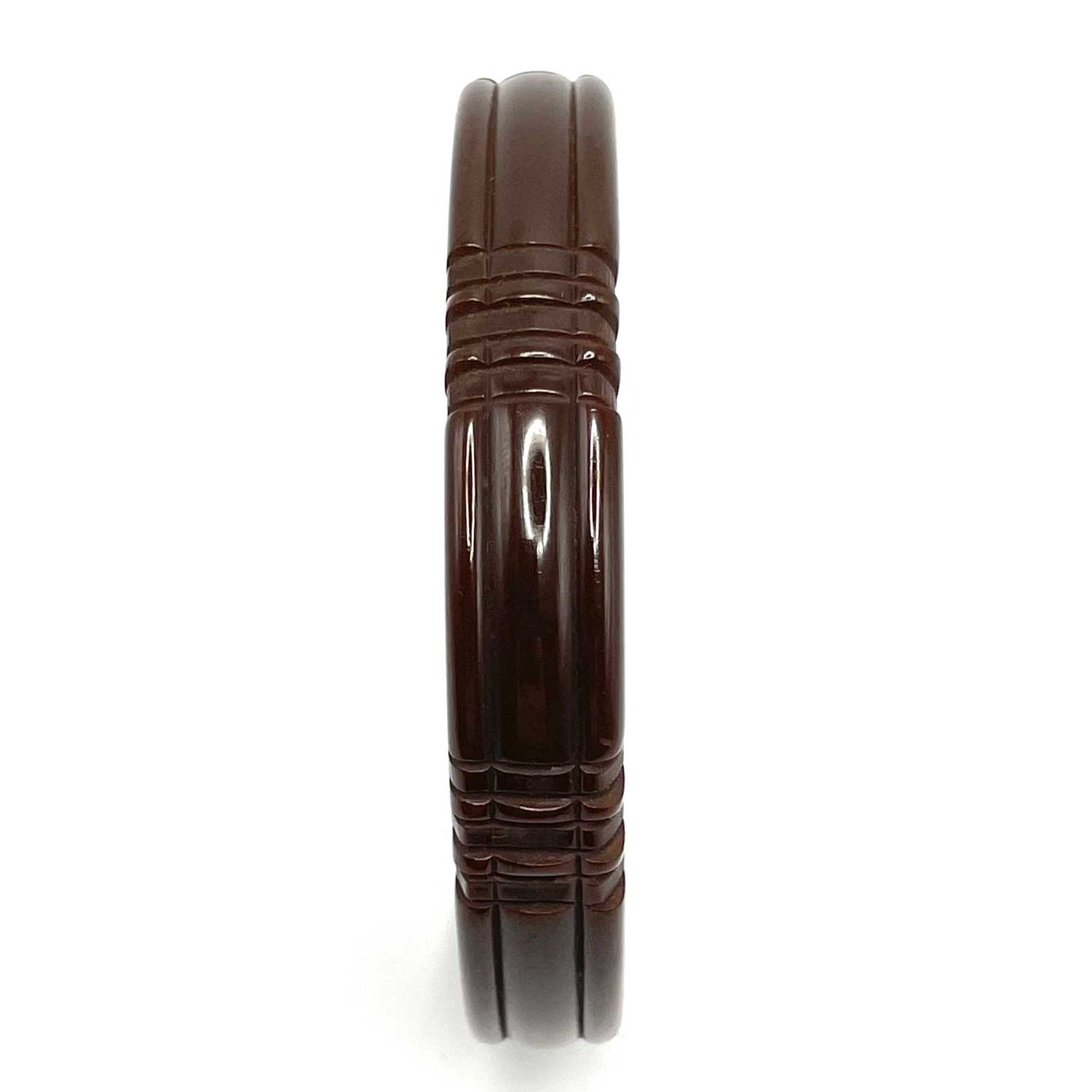 Carved brown bakelite bangle