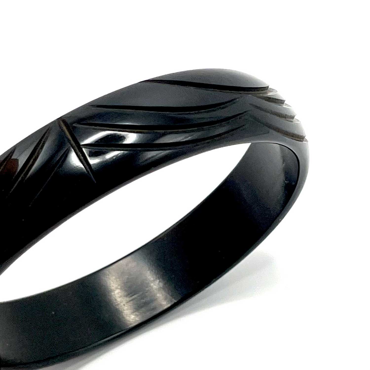 Carved black bakelite bangle