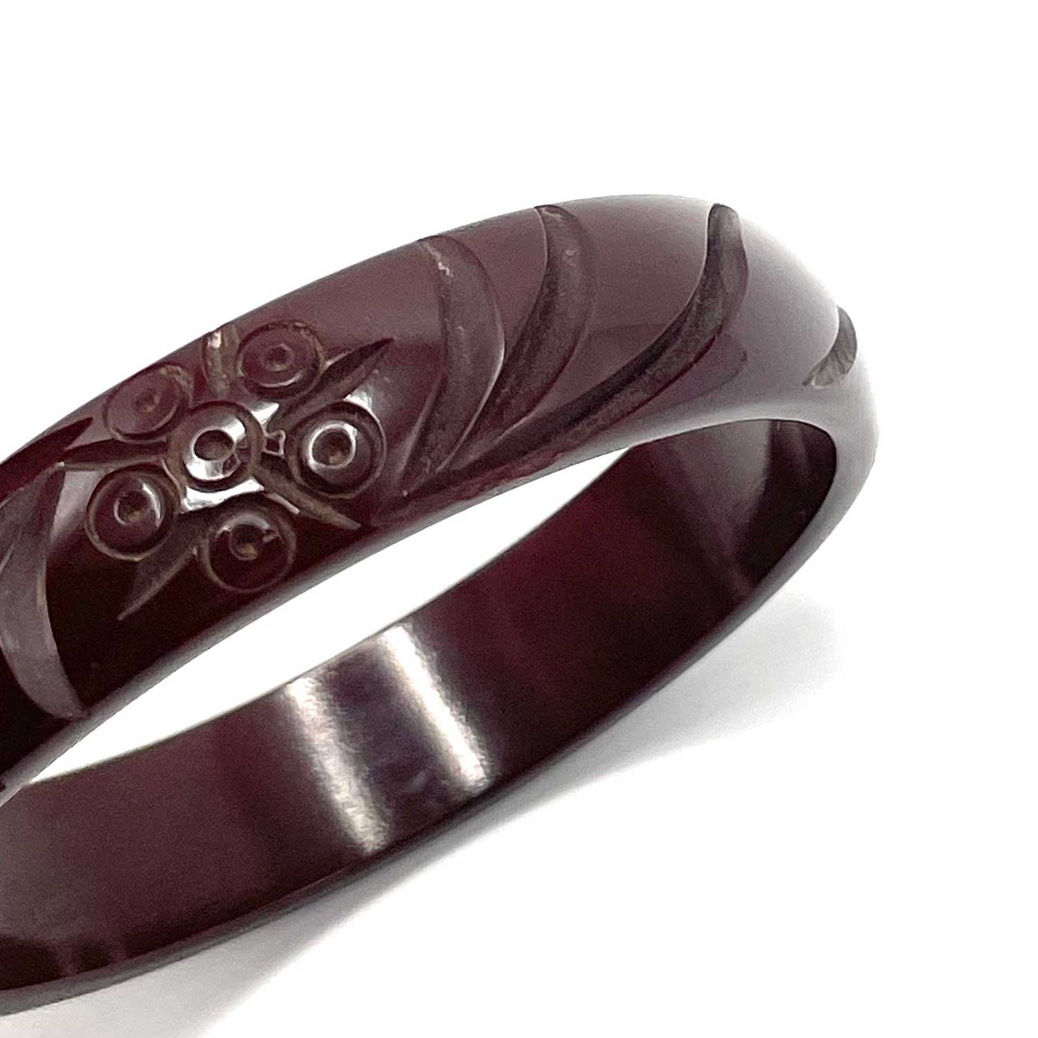 Carved brown bakelite bangle