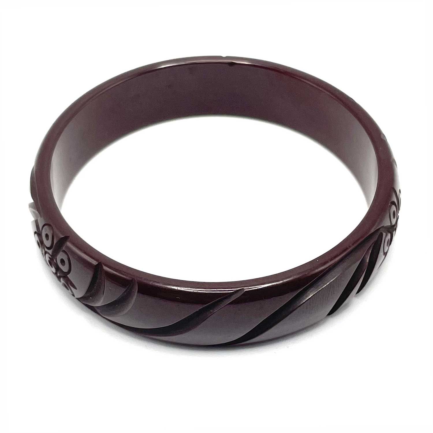 Carved brown bakelite bangle