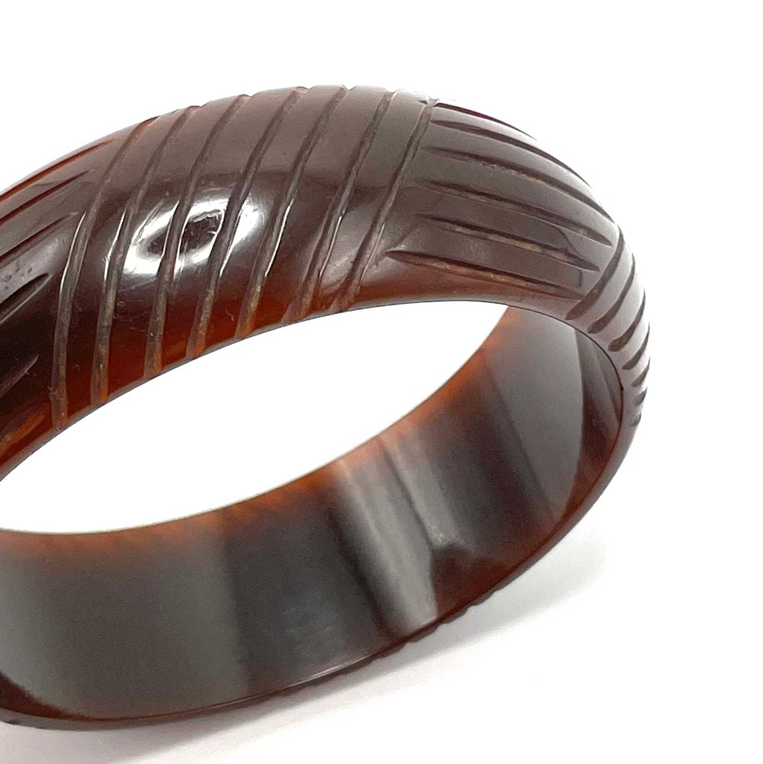 Carved brown bakelite bangle