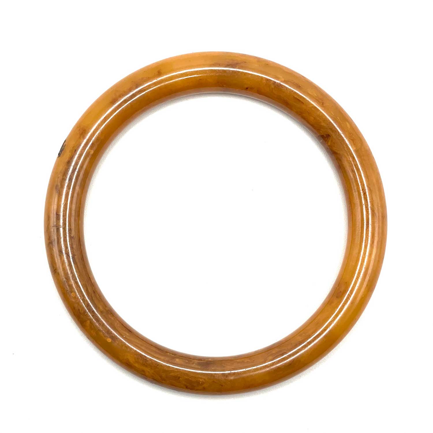 Swirly caramel bakelite bangle