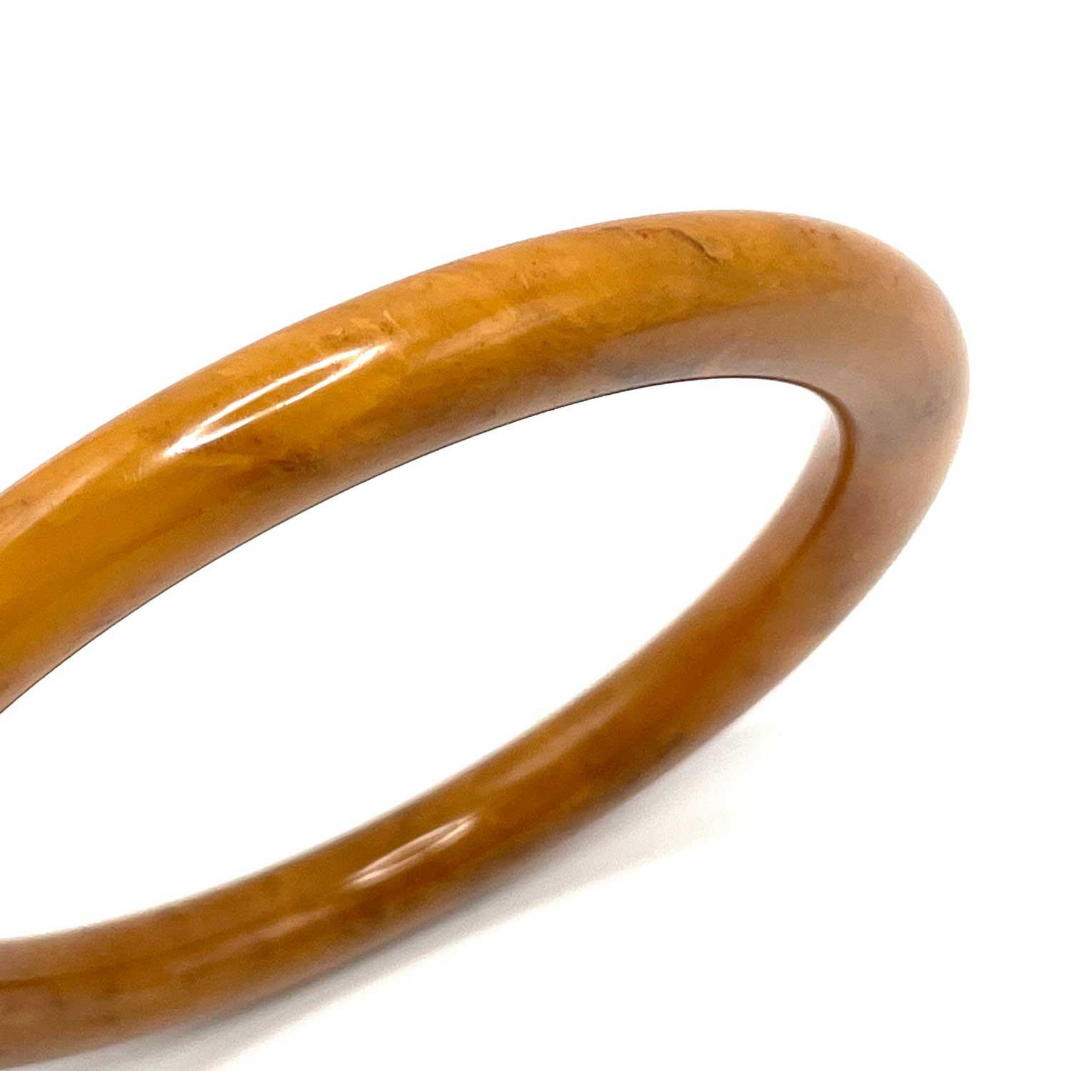 Swirly caramel bakelite bangle