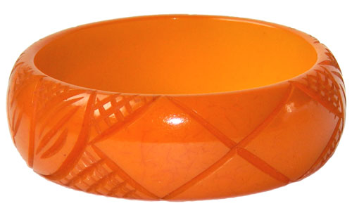 Carved yellow bakelite bangle