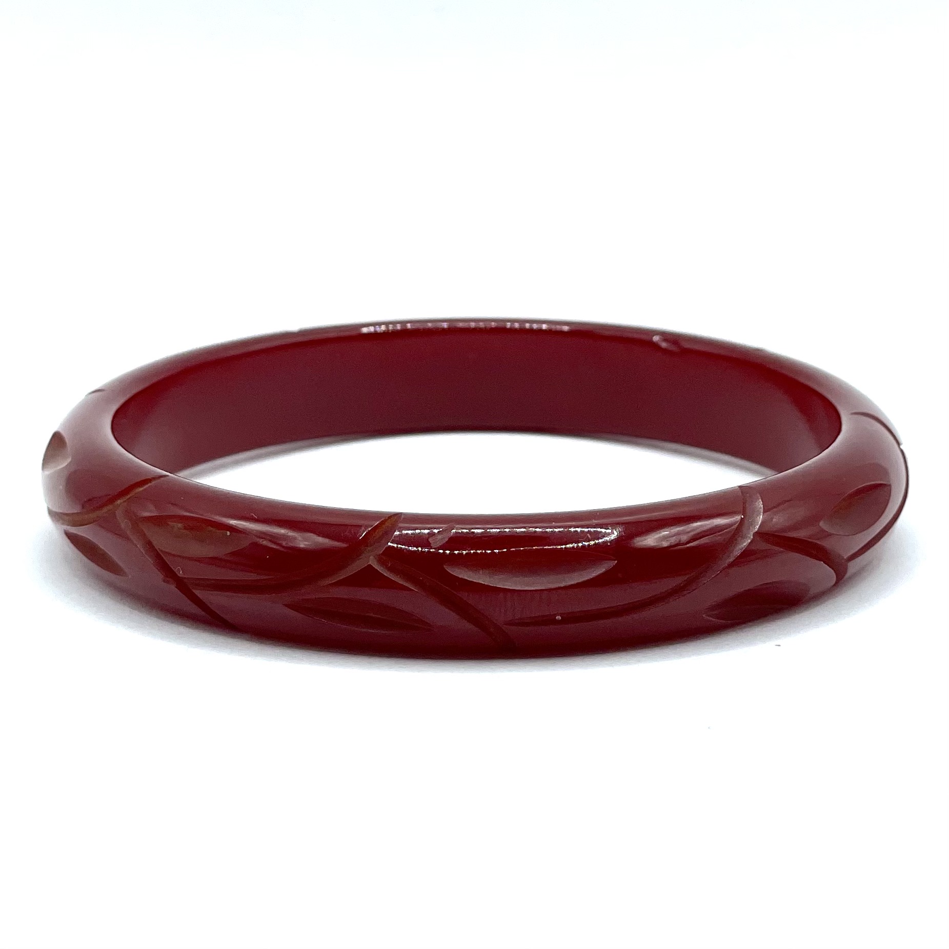 Carved cinnamon bakelite bangle