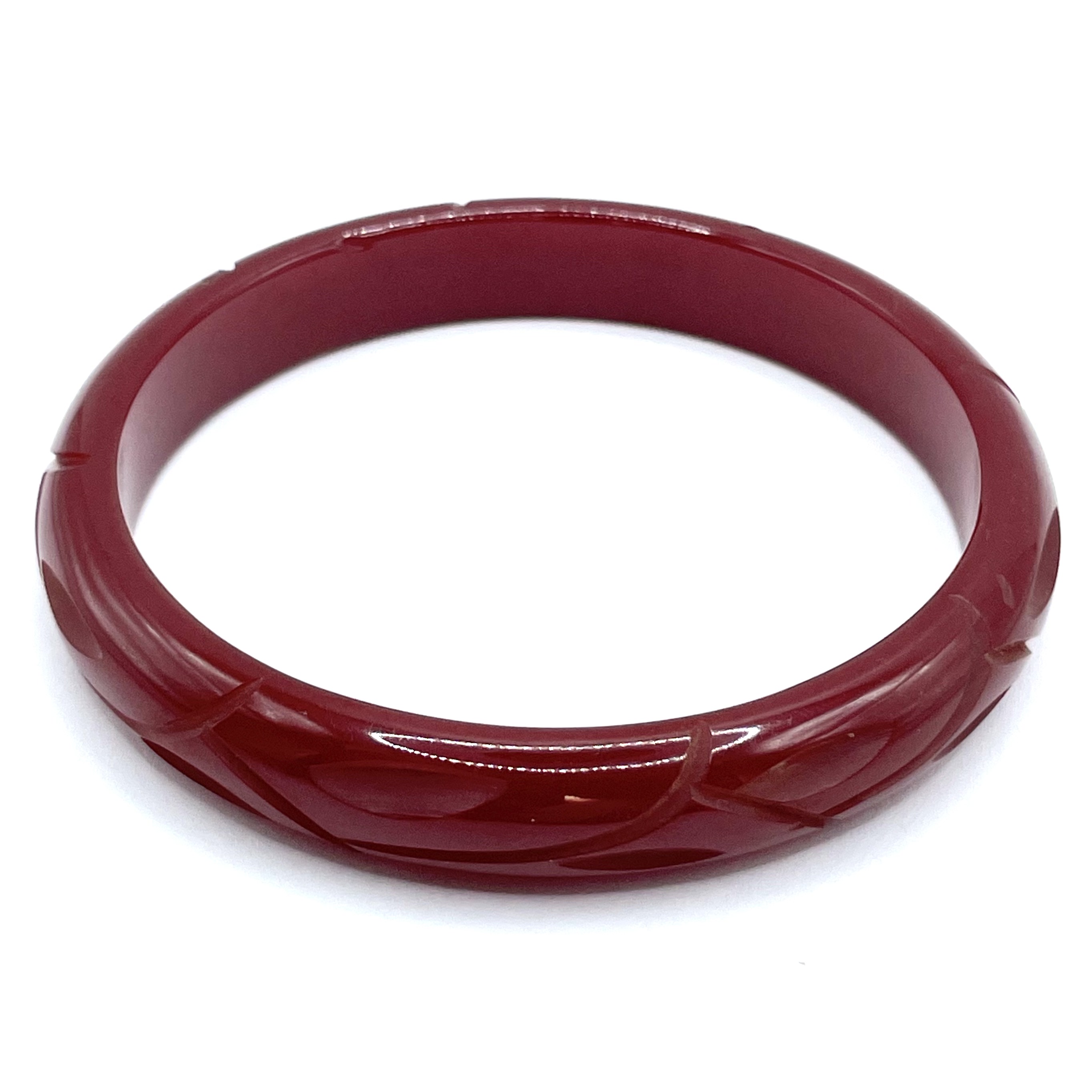 Carved cinnamon bakelite bangle