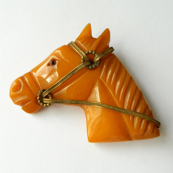 Vintage bakelite horse head brooch