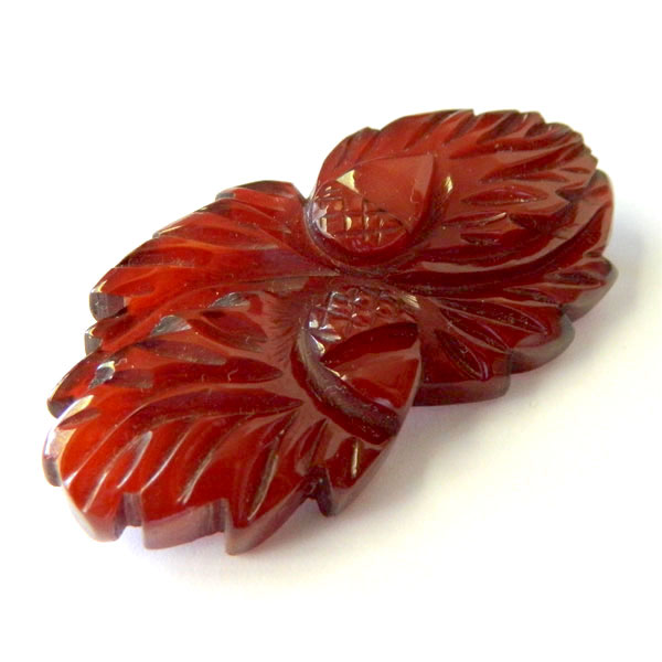 Hand carved bakelite acorn brooch