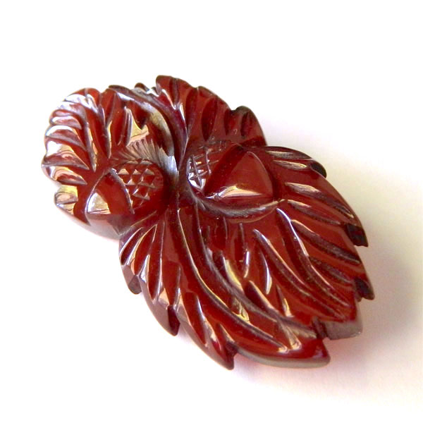 Hand carved bakelite acorn brooch