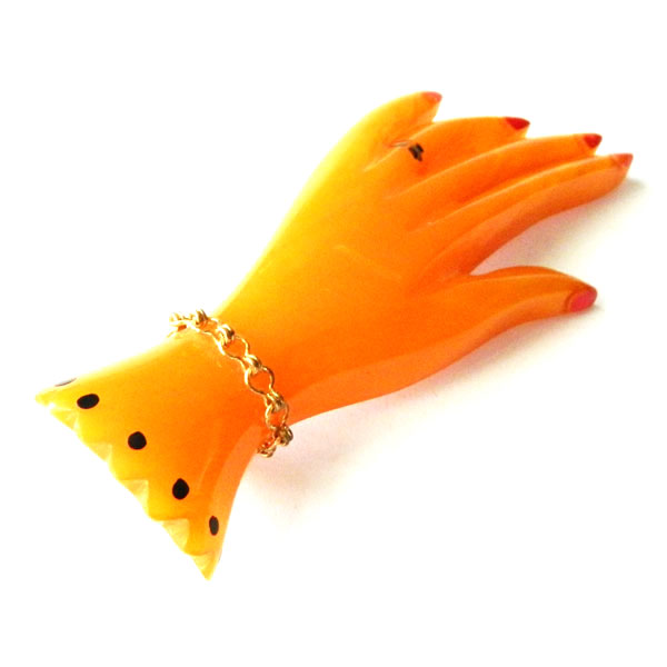 Bakelite hand brooch