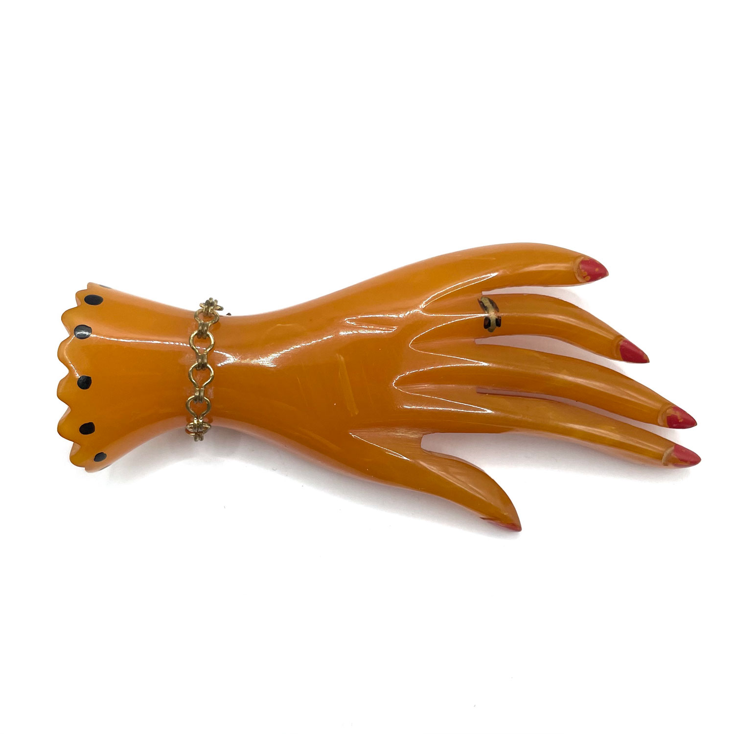 Bakelite hand brooch