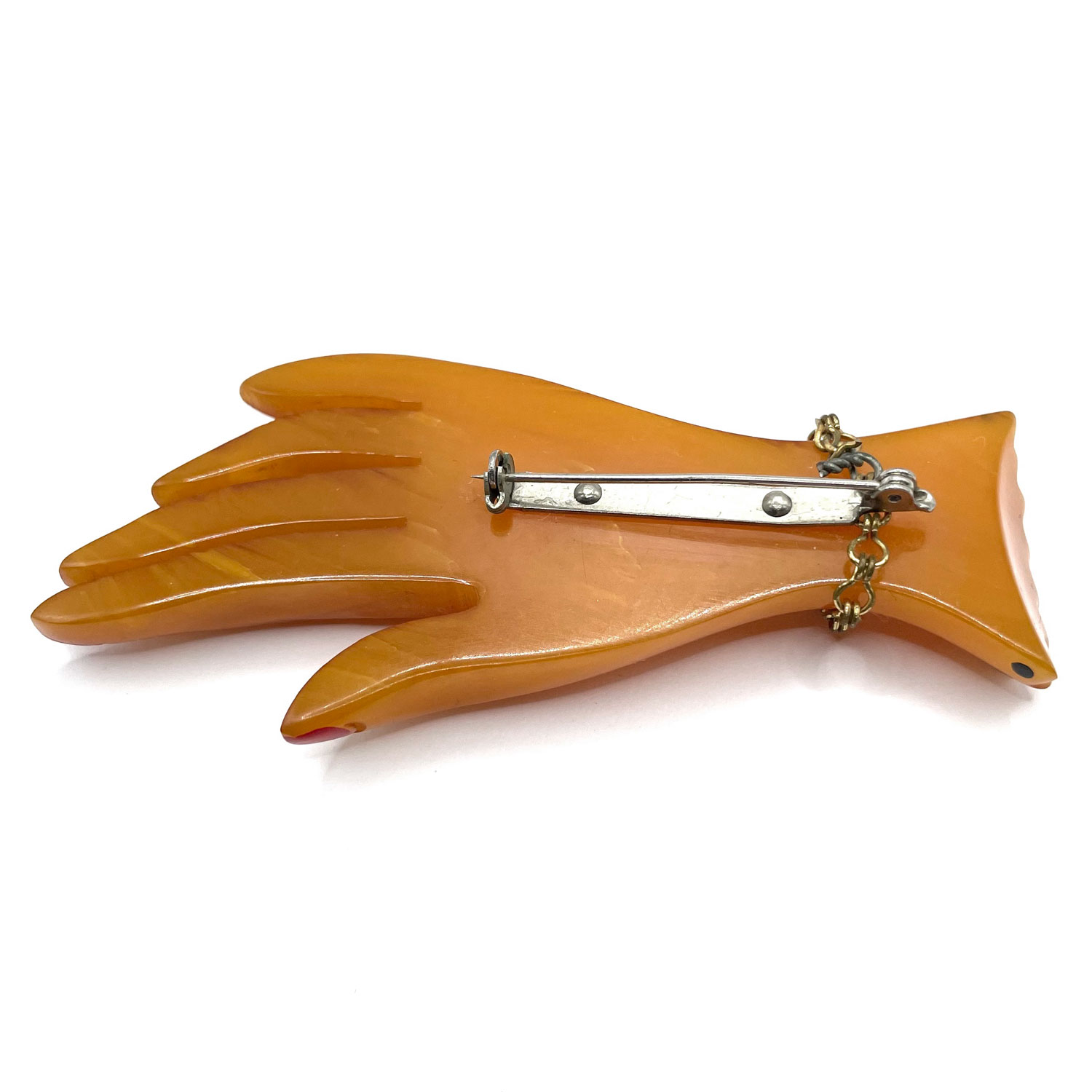 Bakelite hand brooch