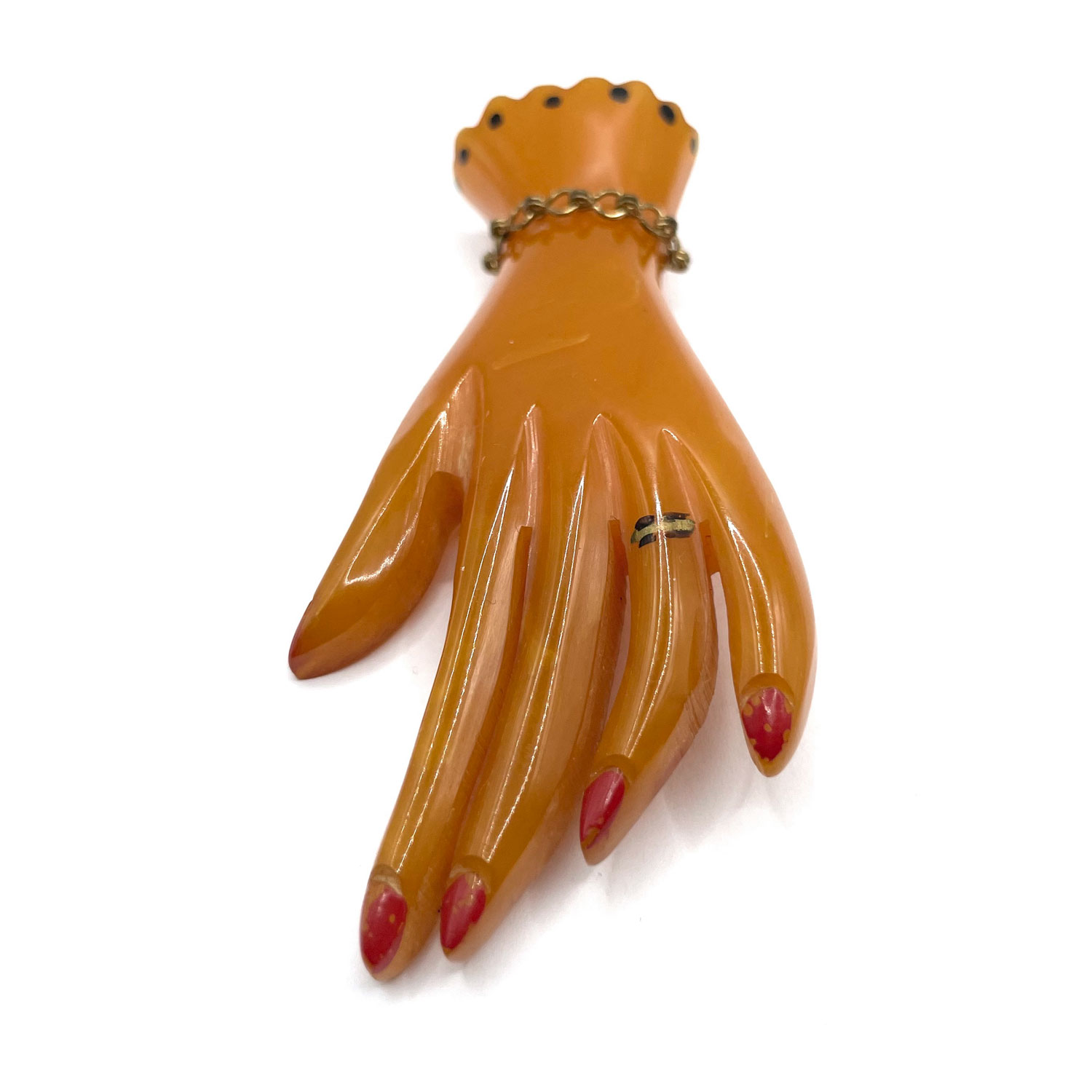 Bakelite hand brooch