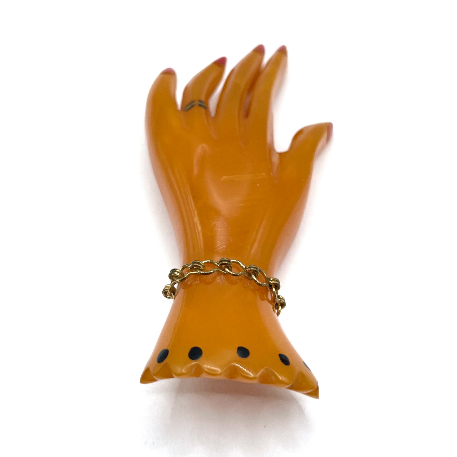 Bakelite hand brooch