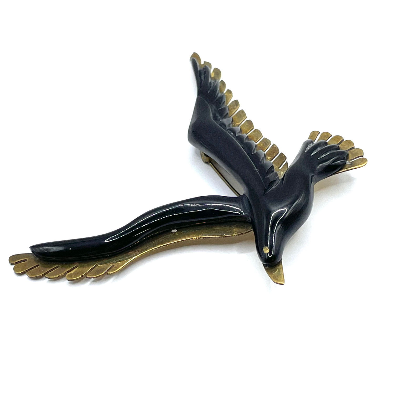 Bakelite and brass bird brooch
