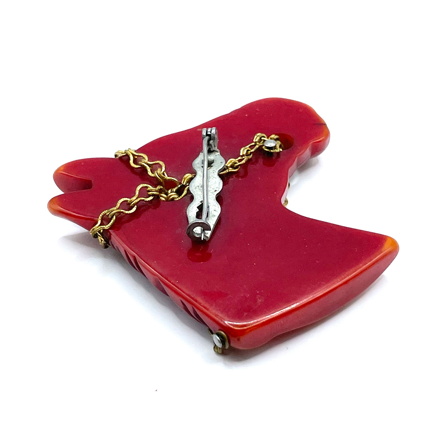 Hand carved bakelite brooch