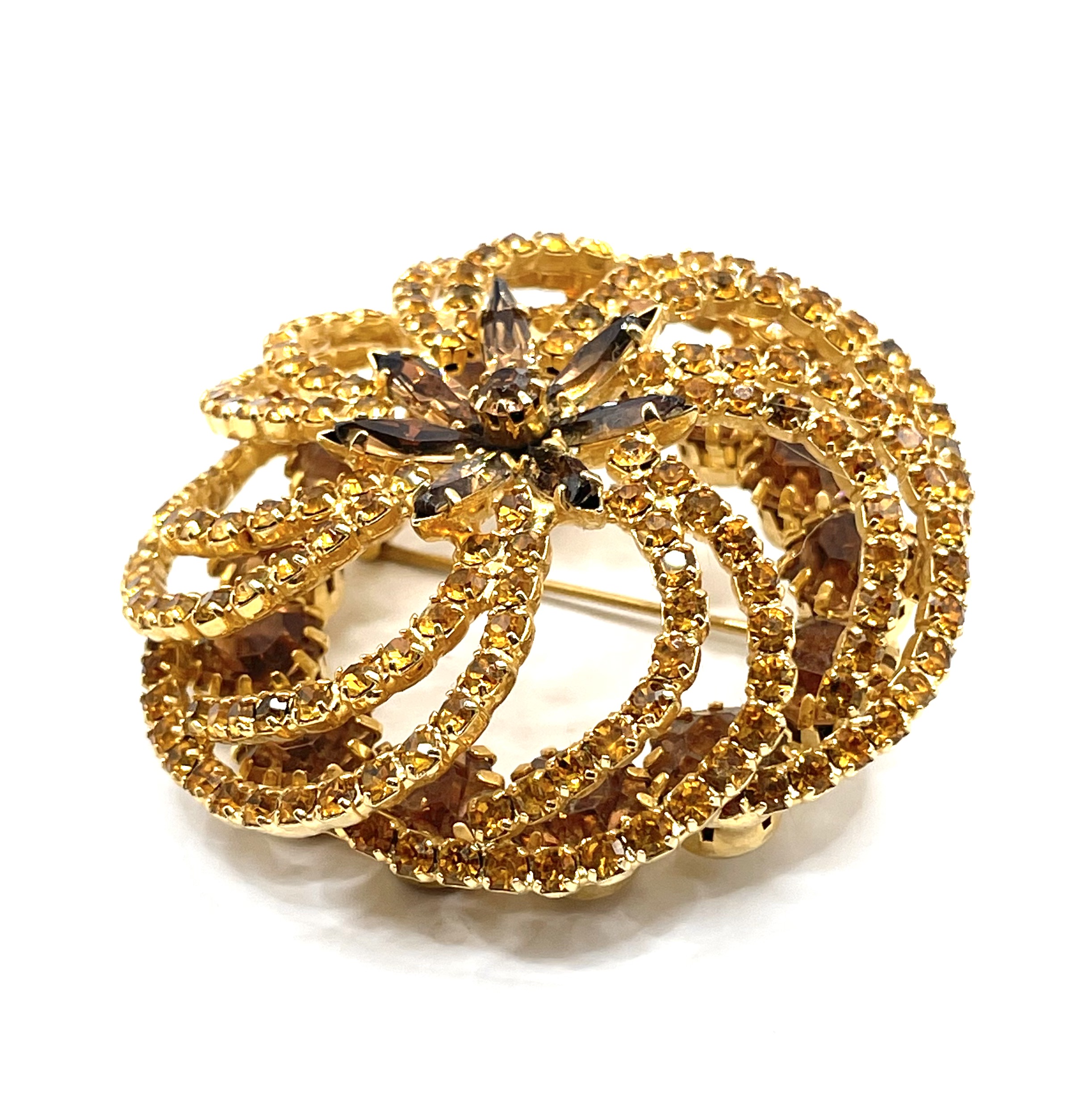 Spiral rhinestone brooch by Hobé