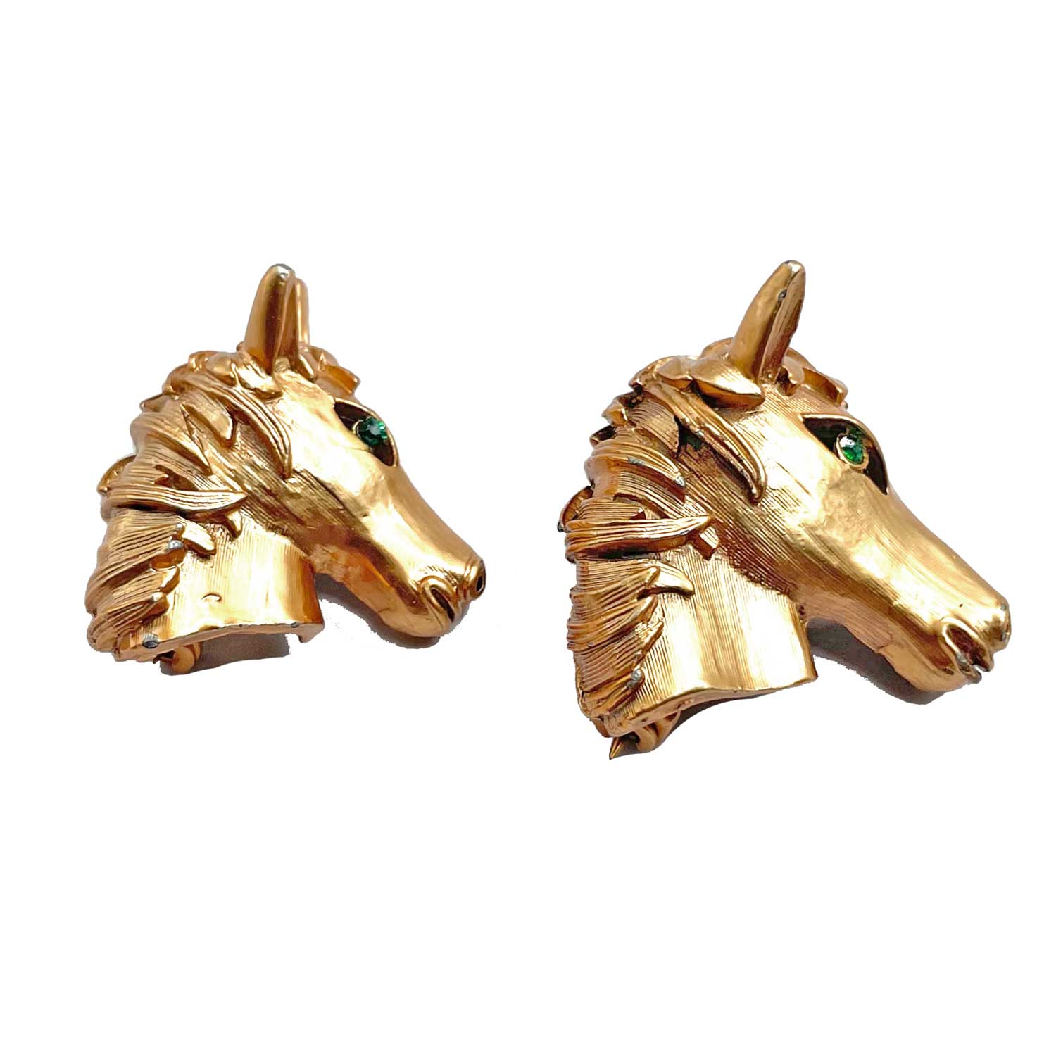 Pair of horse head brooches