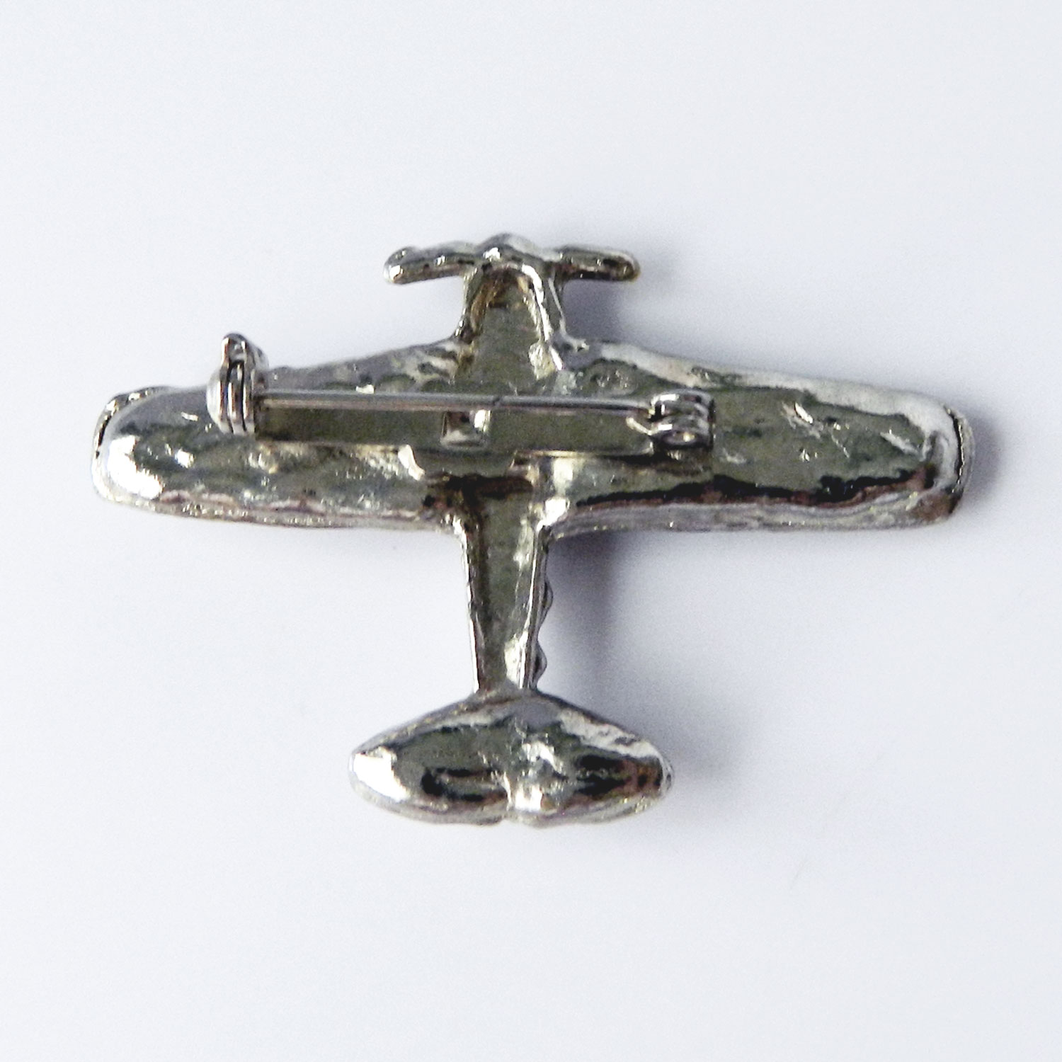 Rhinestone airplane brooch