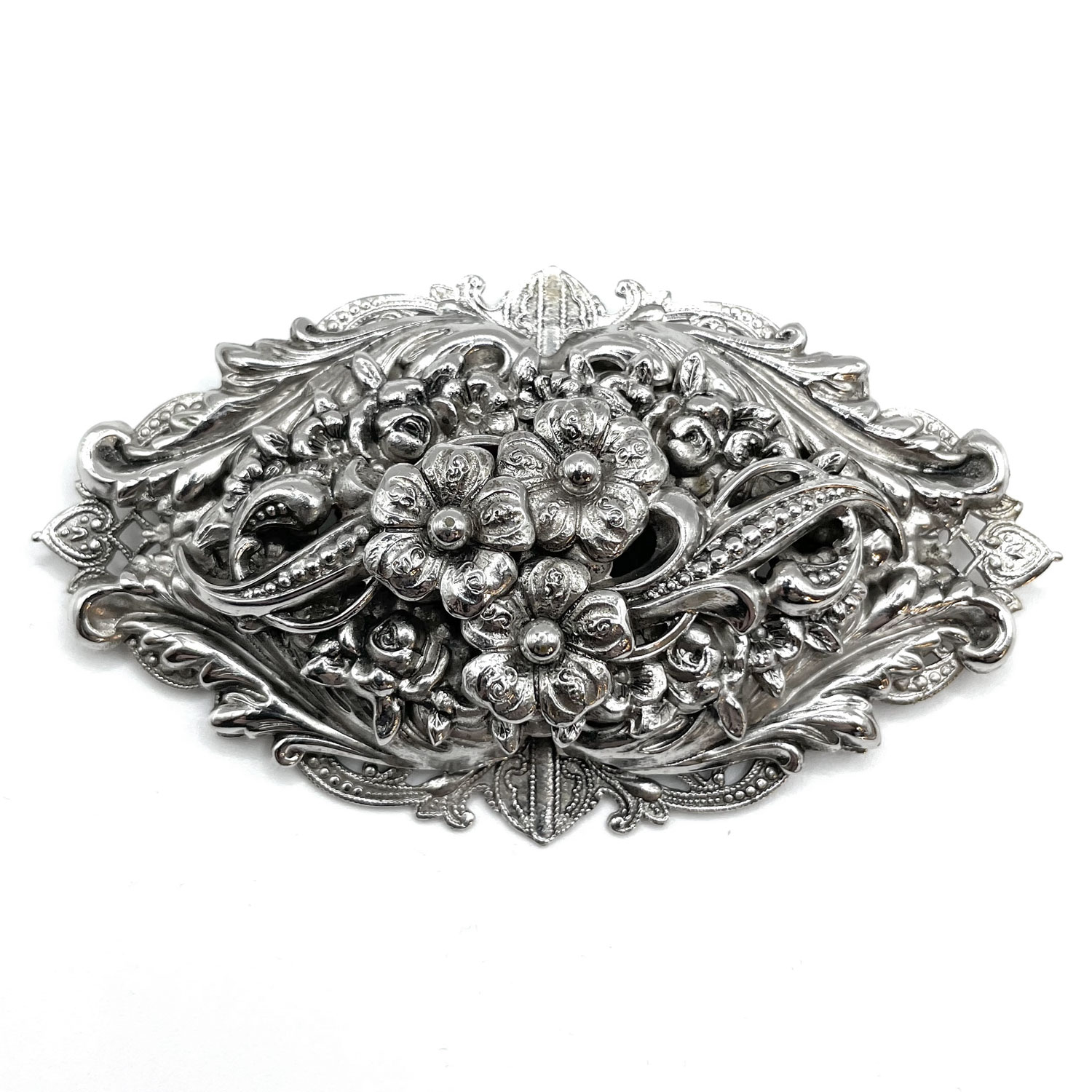 Silver metal floral brooch