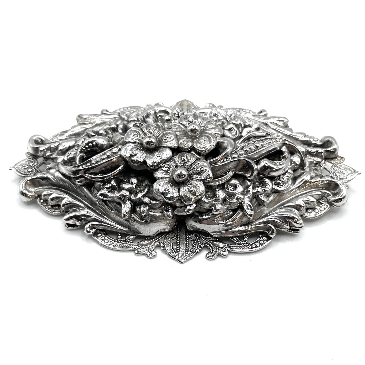 Silver metal floral brooch