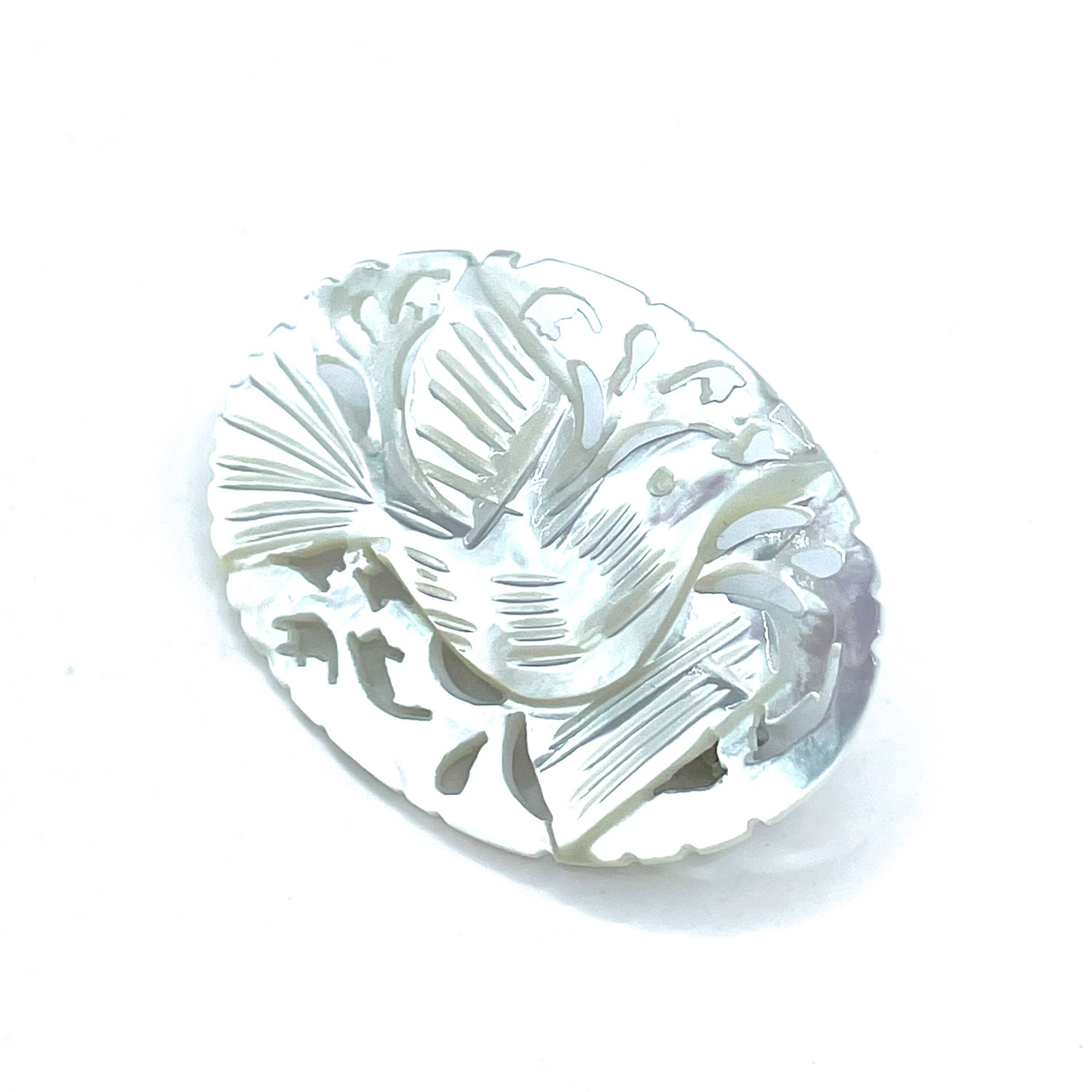 Hand carved mother of pearl brooch