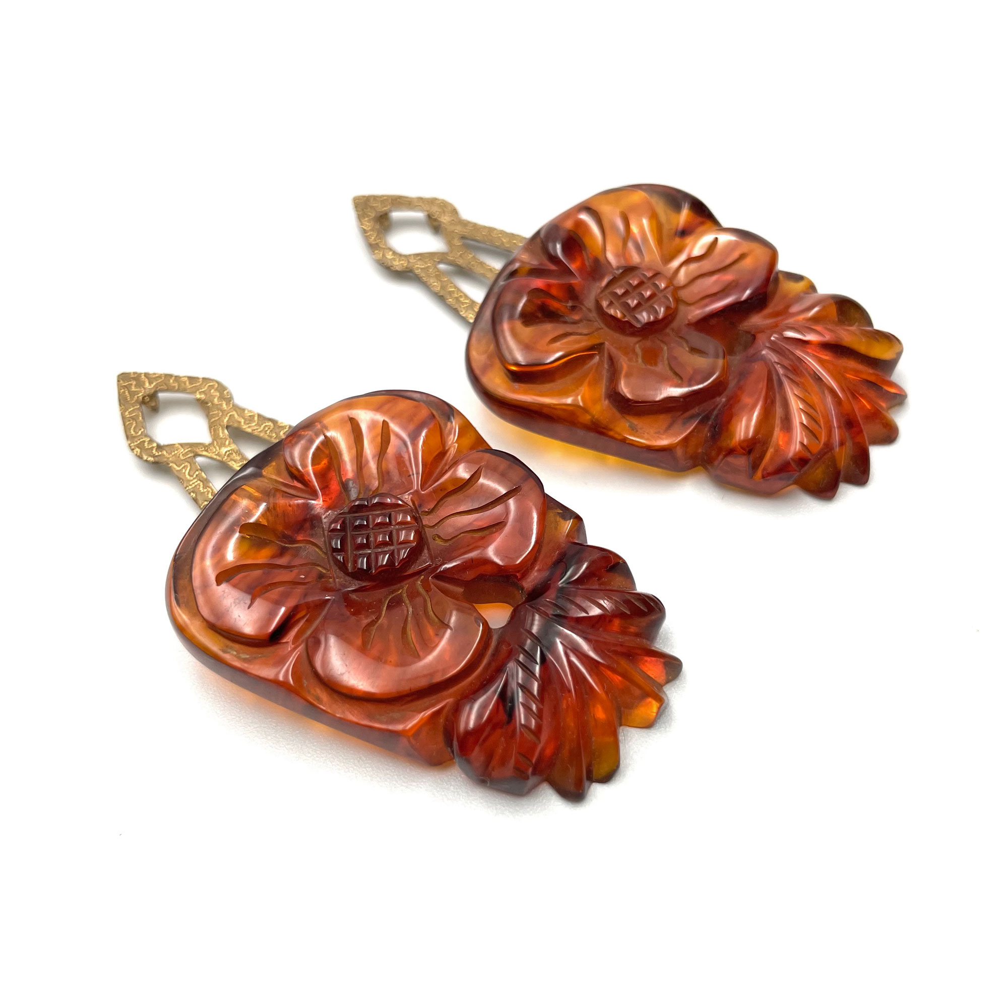 Pair of bakelite dress clips