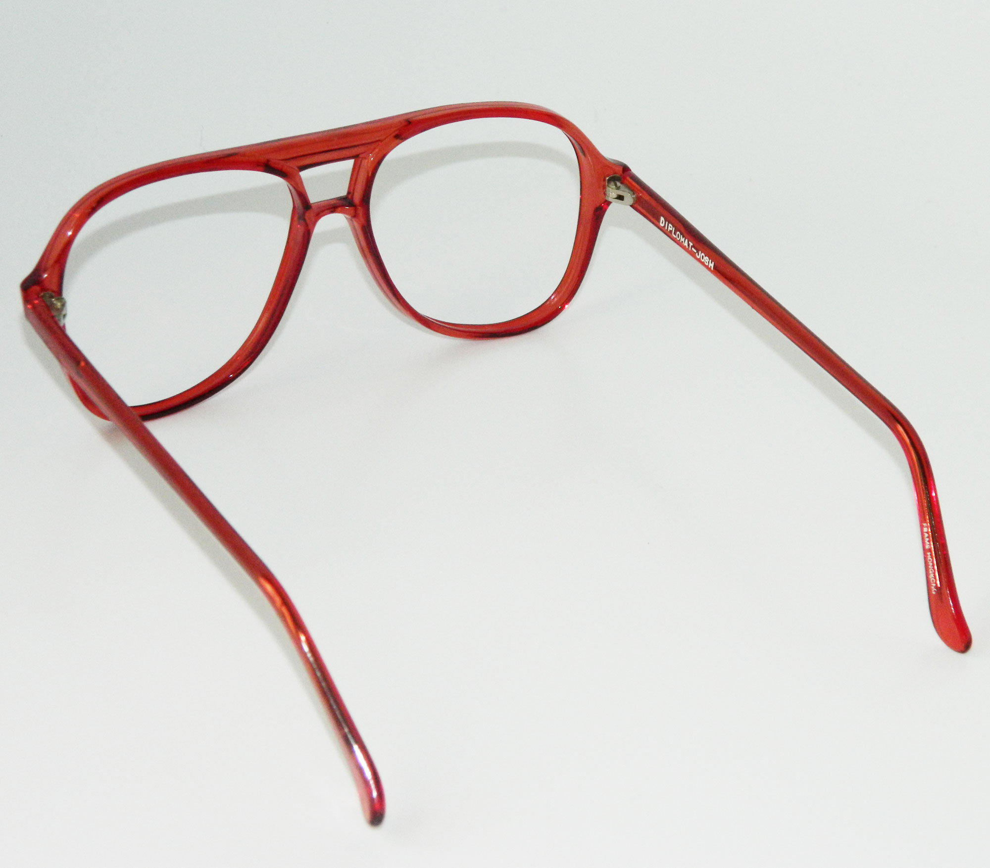 Reddish aviator style eyeglass frames