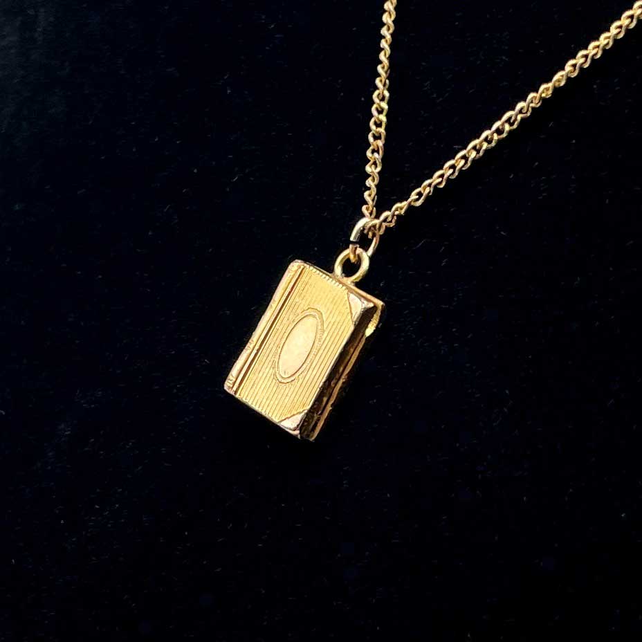 tiny vintage book locket