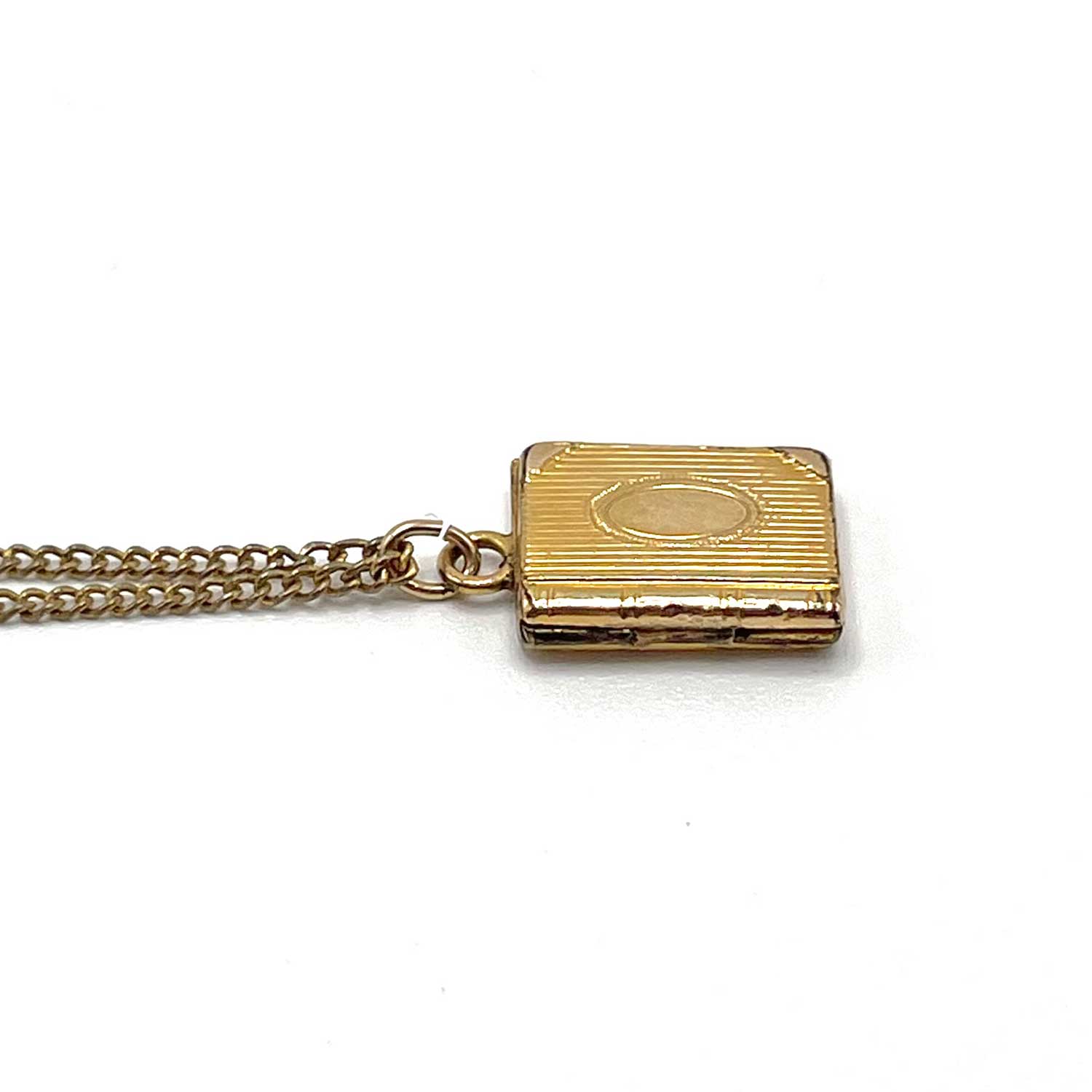 tiny vintage book locket