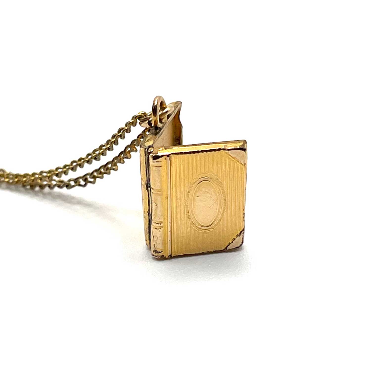 tiny vintage book locket