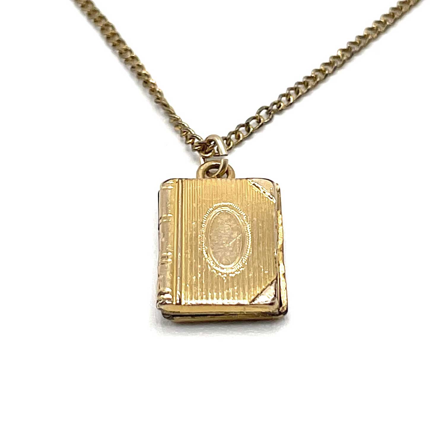 tiny vintage book locket