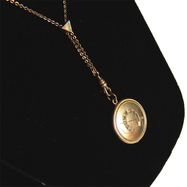 Antique horseshoe locket necklace