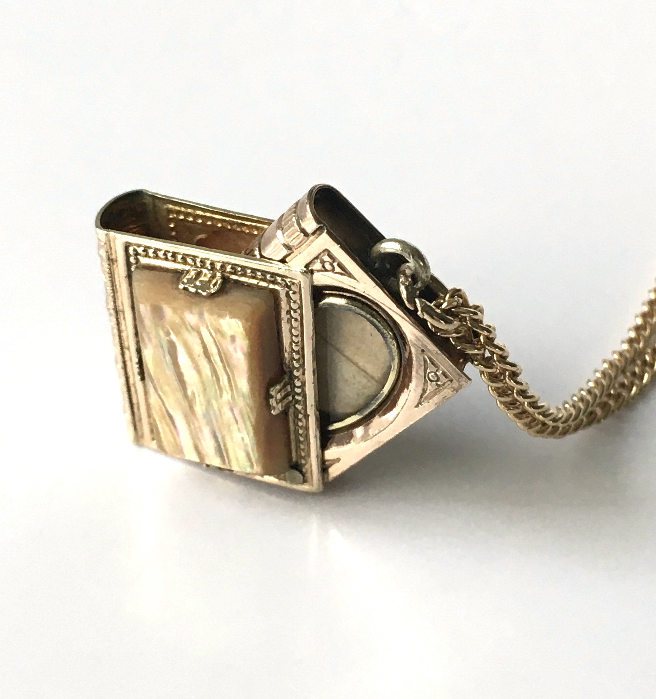 antique book locket